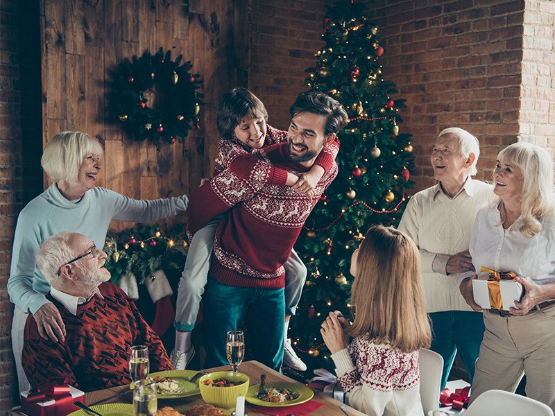 Life Extension, family scene at Christmas with healthy happy faces 